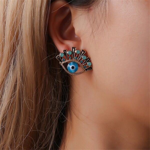 2025/03/1000303561.jpg Aretes ojitos azules