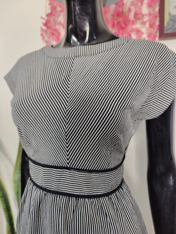 2025/04/1000336263-scaled.jpg Blusa de rayas