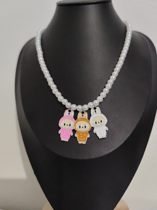 2025/04/1000360525-scaled.jpg 💋 Collar Labubu Love
