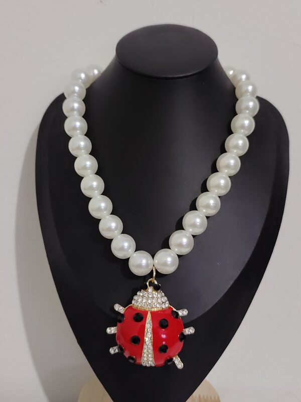 2025/04/1000360527-scaled.jpg 🐞 Collar "Ladybug Queen"