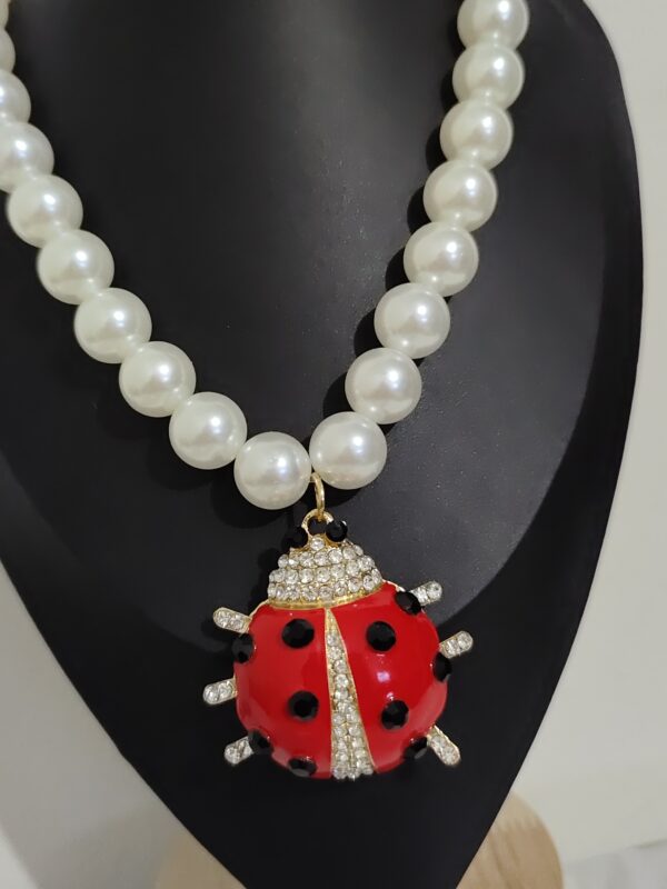 2025/04/1000360529-scaled.jpg 🐞 Collar "Ladybug Queen"
