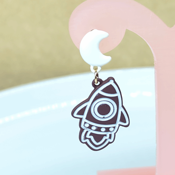 2025/05/1000377940.png 🚀Aretes Galaxia Cute