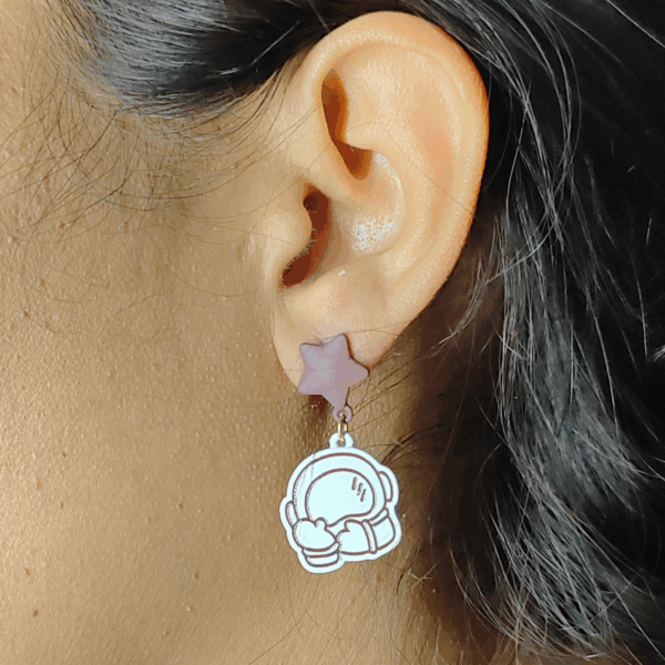 2025/05/1000377941.png 🚀Aretes Galaxia Cute